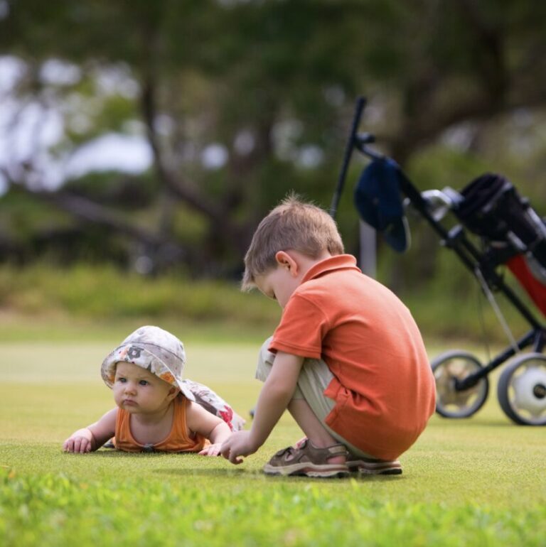 Kids learning golf